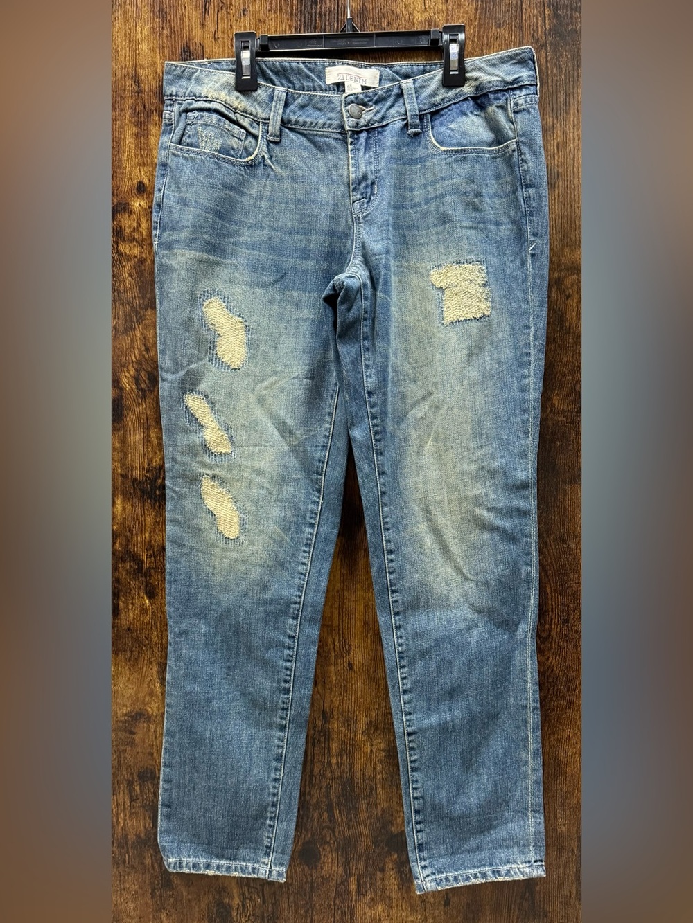 Distressed Light Blue Denim Jeans with Patch Details